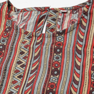 Close-up of metallic floral overlay jacket fabric in turquoise blue with red pomegranate print – Turq & Metallic Poly 3-piece set by Biba.